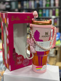 Barbie themed pink tumbler with pearl charm